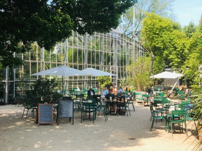 People sitting at the Orangery at the Hortus Botanicus at cute coffee places Amsterdam