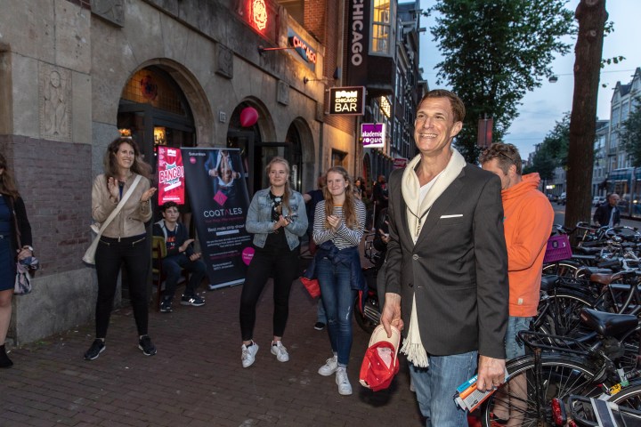 Comedian smiling during a comedy walk