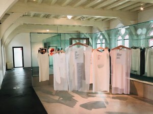 Artwork of hanging dresses by Natalia Ossef